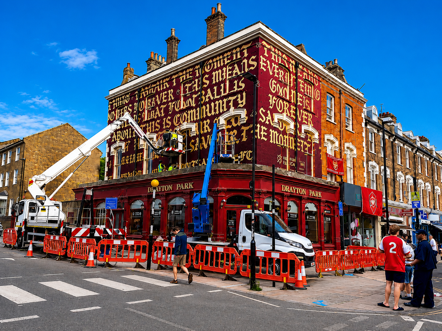 Arsenal Parade Graphics & Flag Installations Two cherry pickers helping transform North London for the celebrations