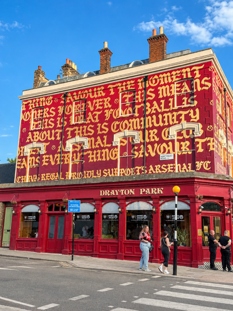 Arsenal Parade Graphics & Flag Installations Two cherry pickers helping transform North London for the celebrations