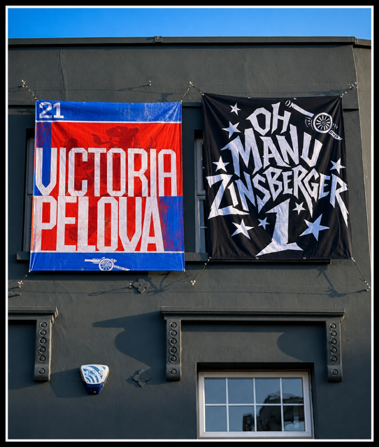 Arsenal Parade Graphics & Flag Installations Two cherry pickers helping transform North London for the celebrations